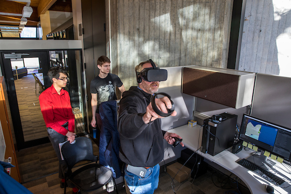 Students working in immersive experience lab